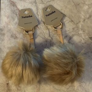 A pair of brand new Natasha Pom-Pom keychains/ bag charm